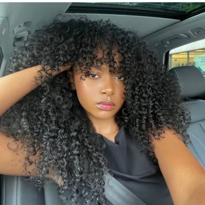 Tissage curly bouclé Raw Hair