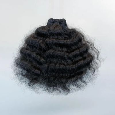 Tissage curly bouclé Raw Hair